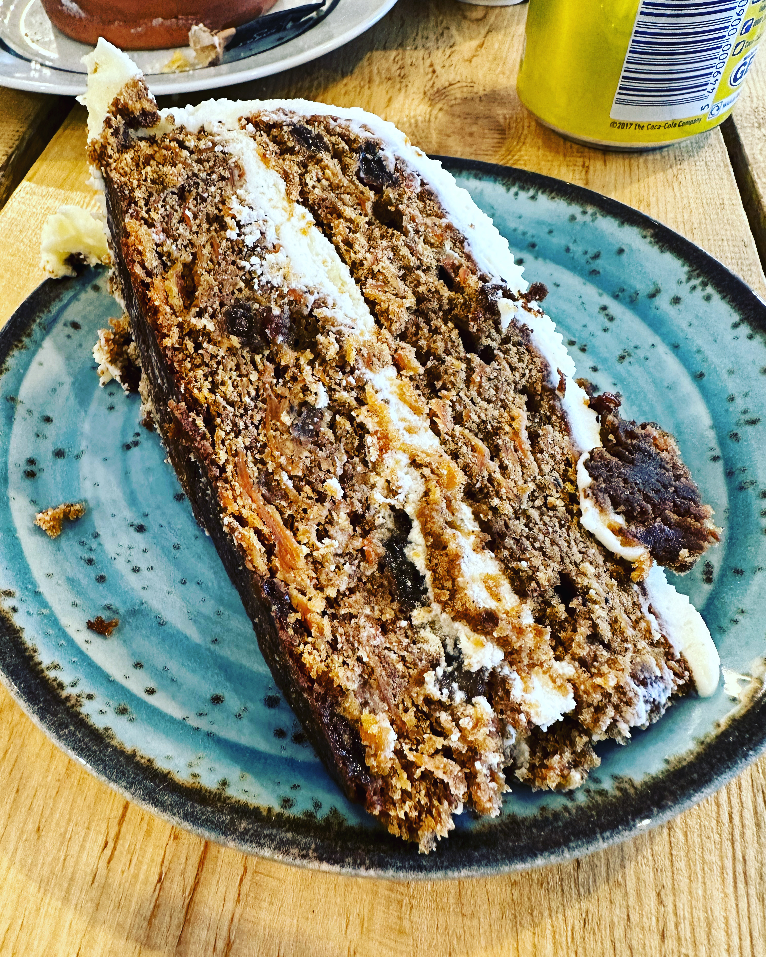 A wedge of Carrot Cake on a plate at Elstree Aerodrome Cafe